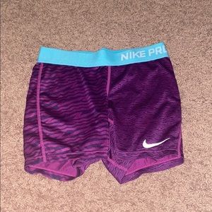 Purple Nike pros